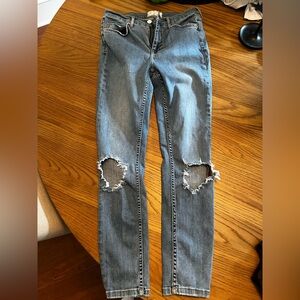 Free People Jeans in Faded Blue with Knee Rips